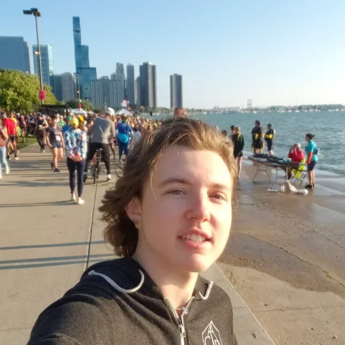 overcoming obstacles a story of trans male athlete limbering ostergaard at the Chicago triathlon