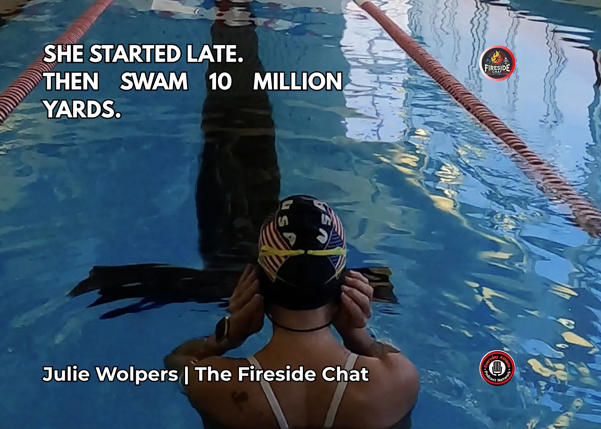 Julie Wolpers sitting at the edge of an indoor swimming pool before a swim.