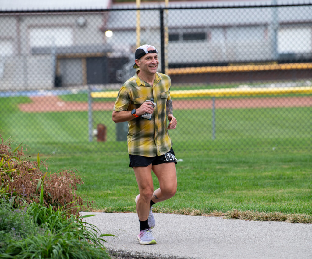 Jason Bahamundi running an ultramarathon while preparing for the Across The Years Last Person Standing race.