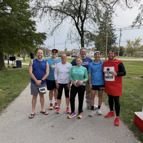 Everyday Athlete Clubhouse runners and supporters gather at Hustle in the Heartland in Lebanon, Indiana, during the 2026 Run Club Tour.